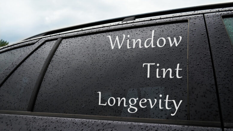 Window tint longevity - tinted windows covered with rain